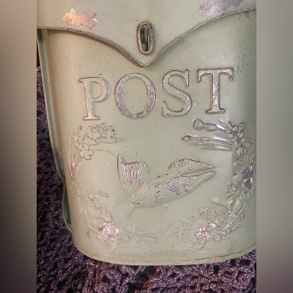 Decorative metal mailbox.